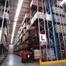 Heavy-duty Australian-made pallet racking in a warehouse storage setup, Industrial warehouse featuring robust, Australian-made pallet racking for bulk inventory, Steel components of Australian-made pallet racking designed for long-lasting durability, Australian pallet racking system installed for optimal warehouse organisation, Customisable pallet racking solutions manufactured in Australia for efficient storage, Warehouse workers loading pallets onto Australian-designed racking system, Close-up of sturdy Australian pallet racking with adjustable shelving options, Heavy-duty pallet racking made in Australia, supporting multiple shelving levels